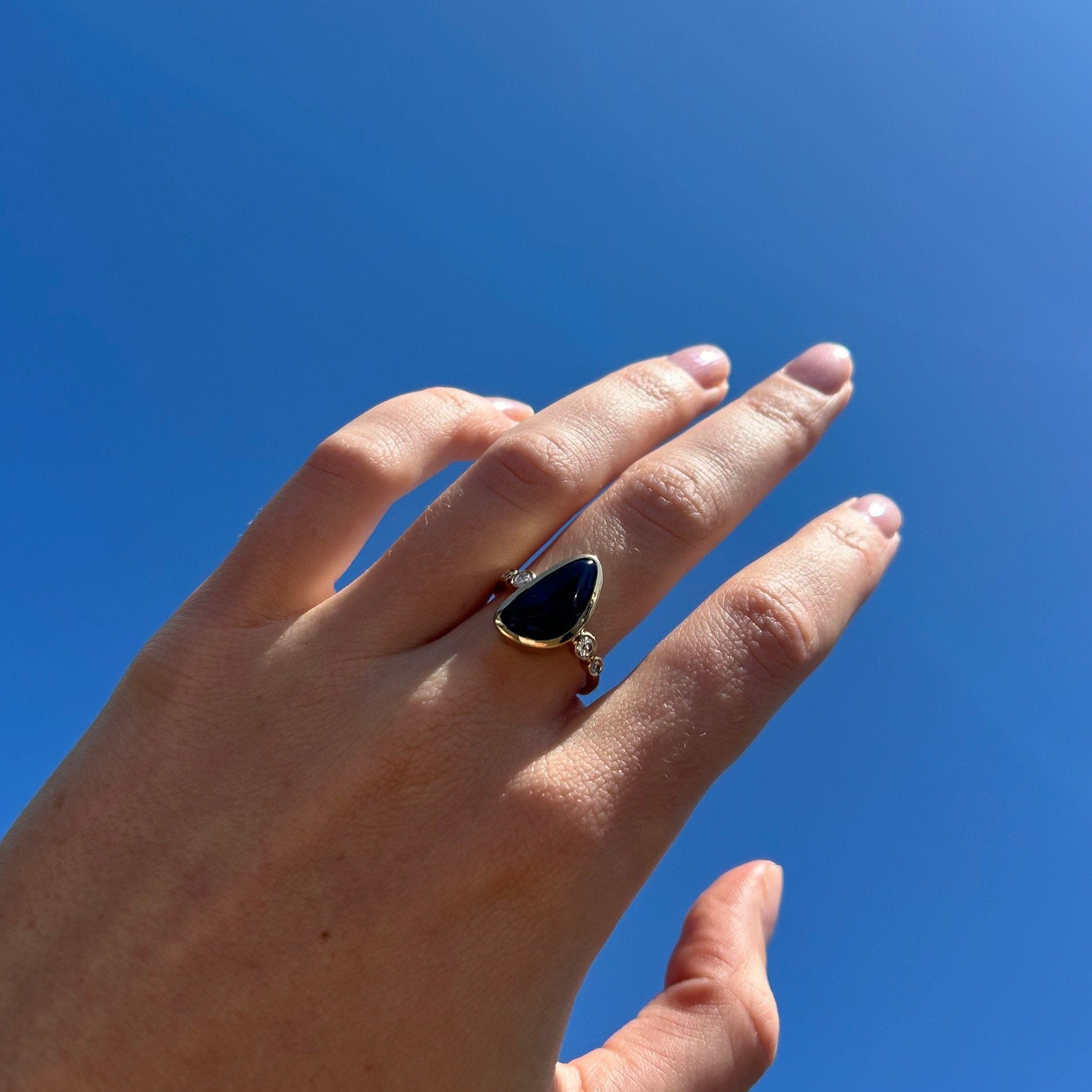 opal ring on model hand