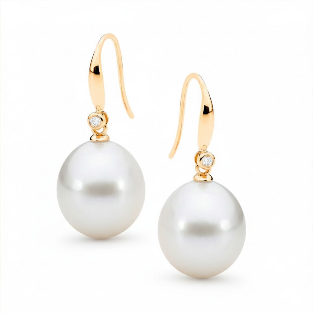 Large Edison Pearl earrings with gold hooks and diamond accents on a white background | Ikecho Australia