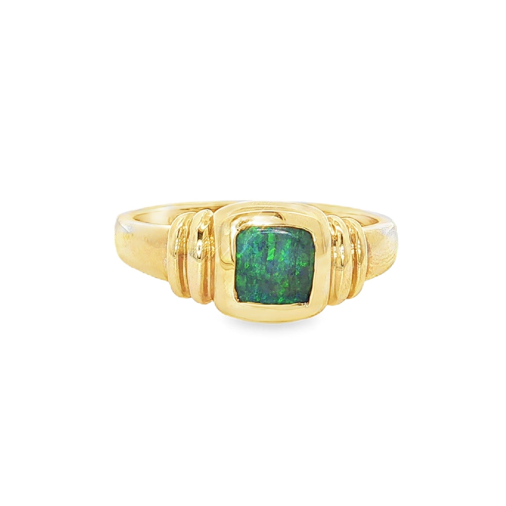 Gold ring with a green Australian opal gemstone on a white background | Ikecho Australia