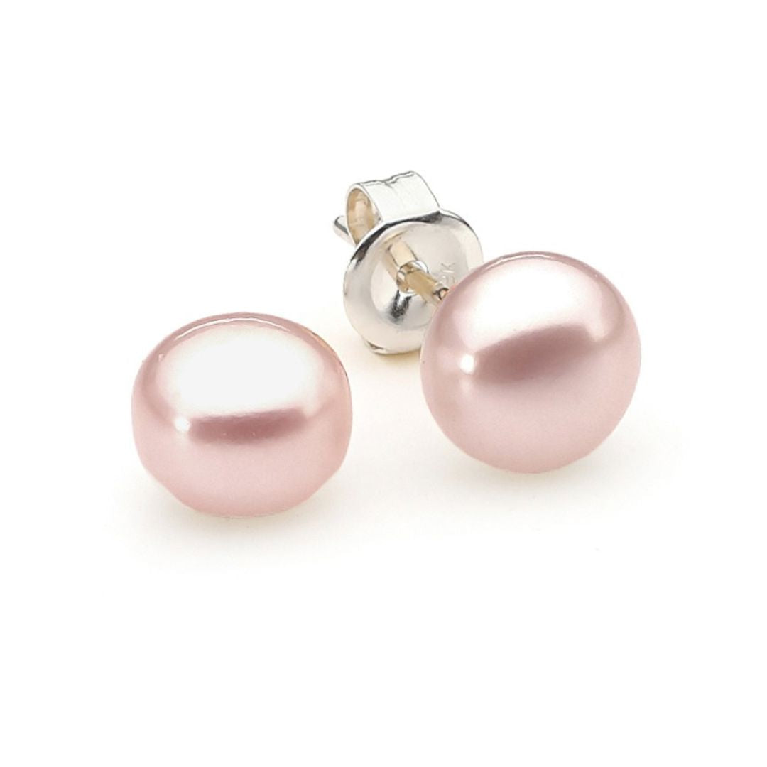 Pink pearl earrings with silver posts on a white background | Ikecho Australia