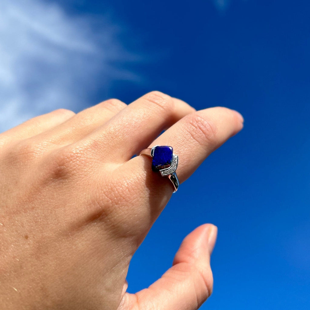 opal ring on model hand