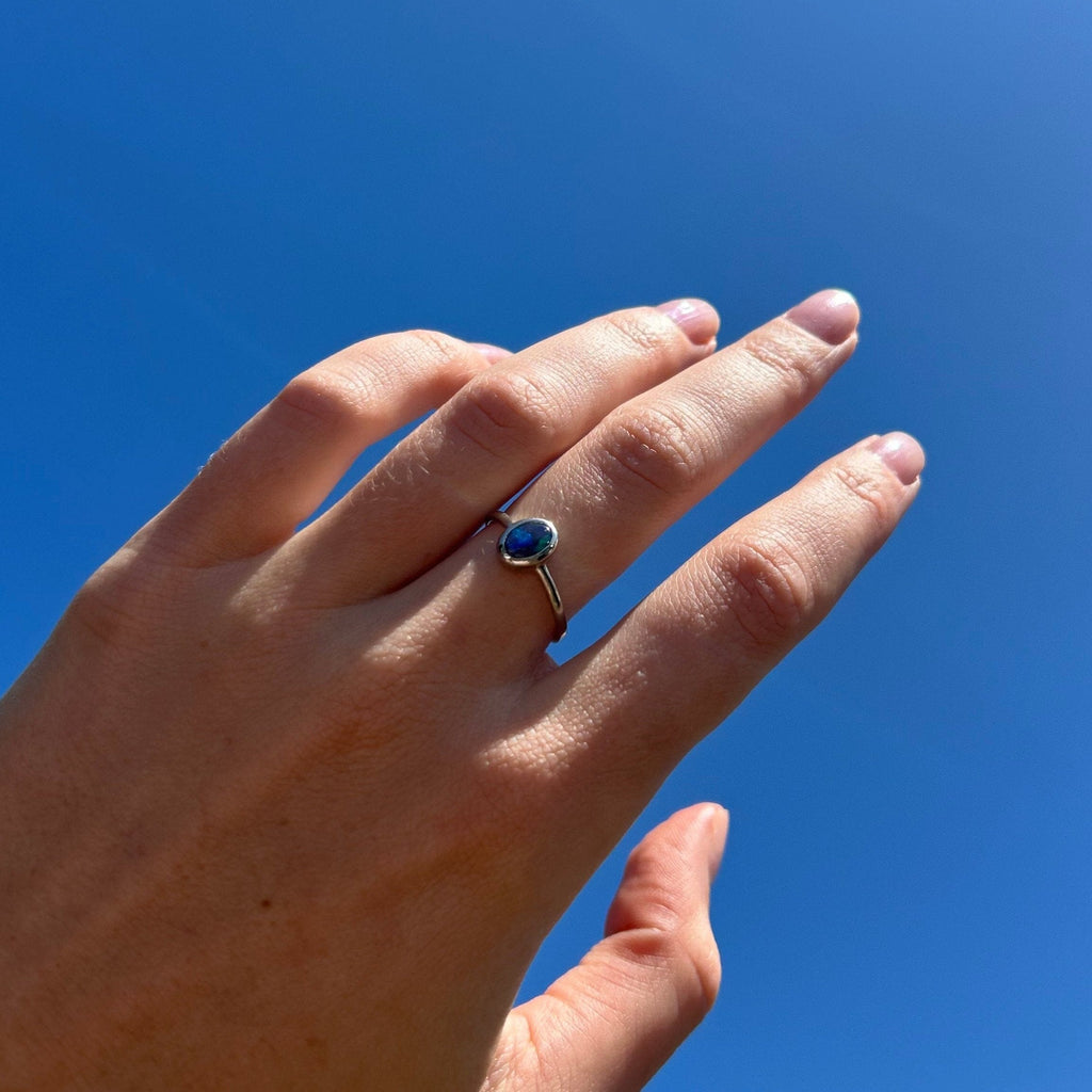 opal ring on model hand