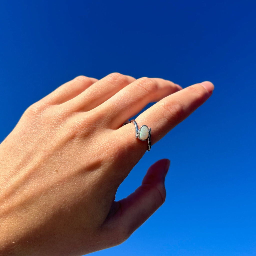 opal ring on model hand