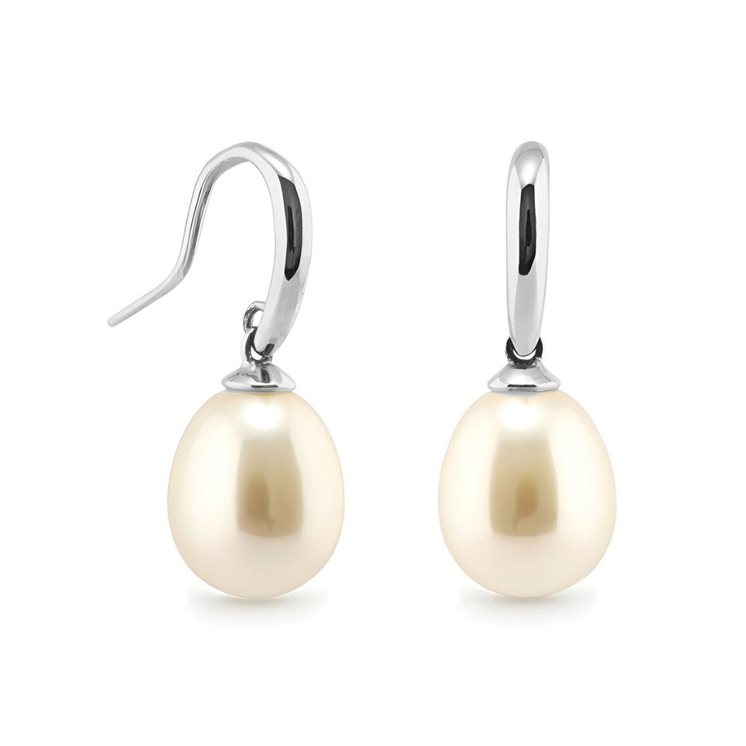 Large pearl earrings with silver hooks on a white background | Ikecho Australia