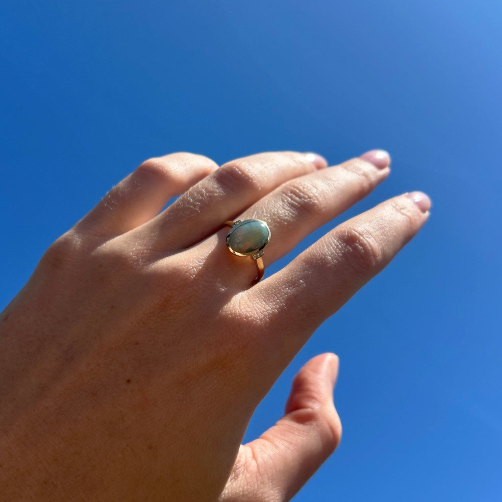 opal ring on model hand